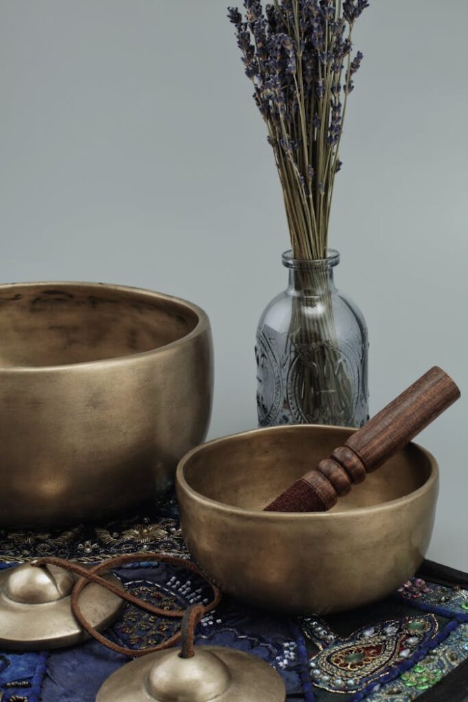 Tibetan singing bowls with lavender create a calming meditation space.